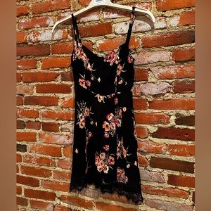 Reformation. Size 0. Black mini dress with pink flowers & black lace.